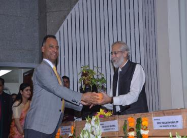 Sh. Vijay Dev, Chief Secretary, GNCTD while felicitating Hon'ble Mr. Justice M.B. Lokur, Former Judge Hon’ble Supreme Court of India/Parton DDRS during Decennial Celebration of DDRS on 27.11.2019.
